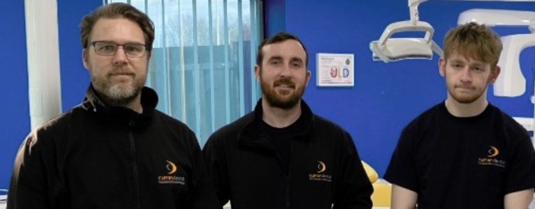 three curran engineers in uniform