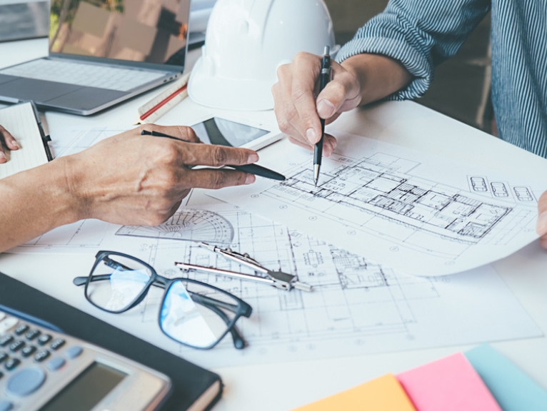 a team of designers working on a dental practice