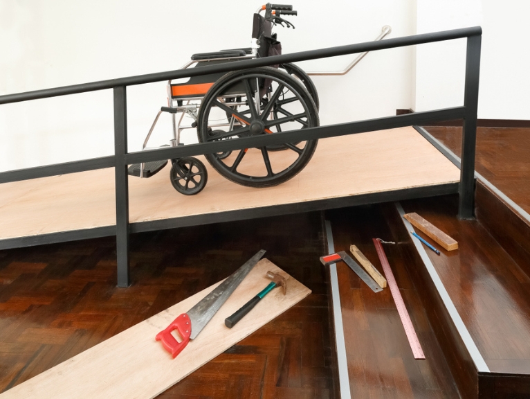 A wheelchair access ramp being installed in a dental practice