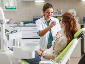 a Happy dental patient receiving dental treatment